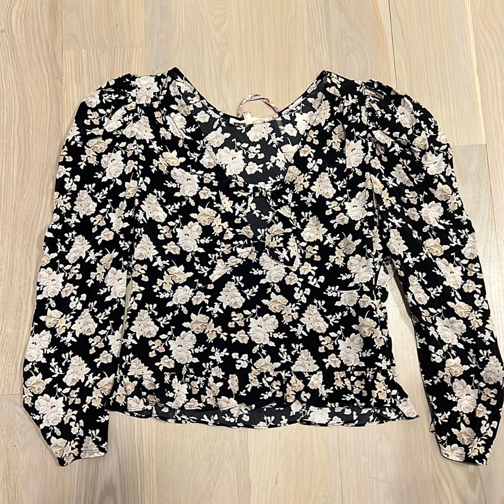 It is a size ten and in good condition. It is from love shack fancy.